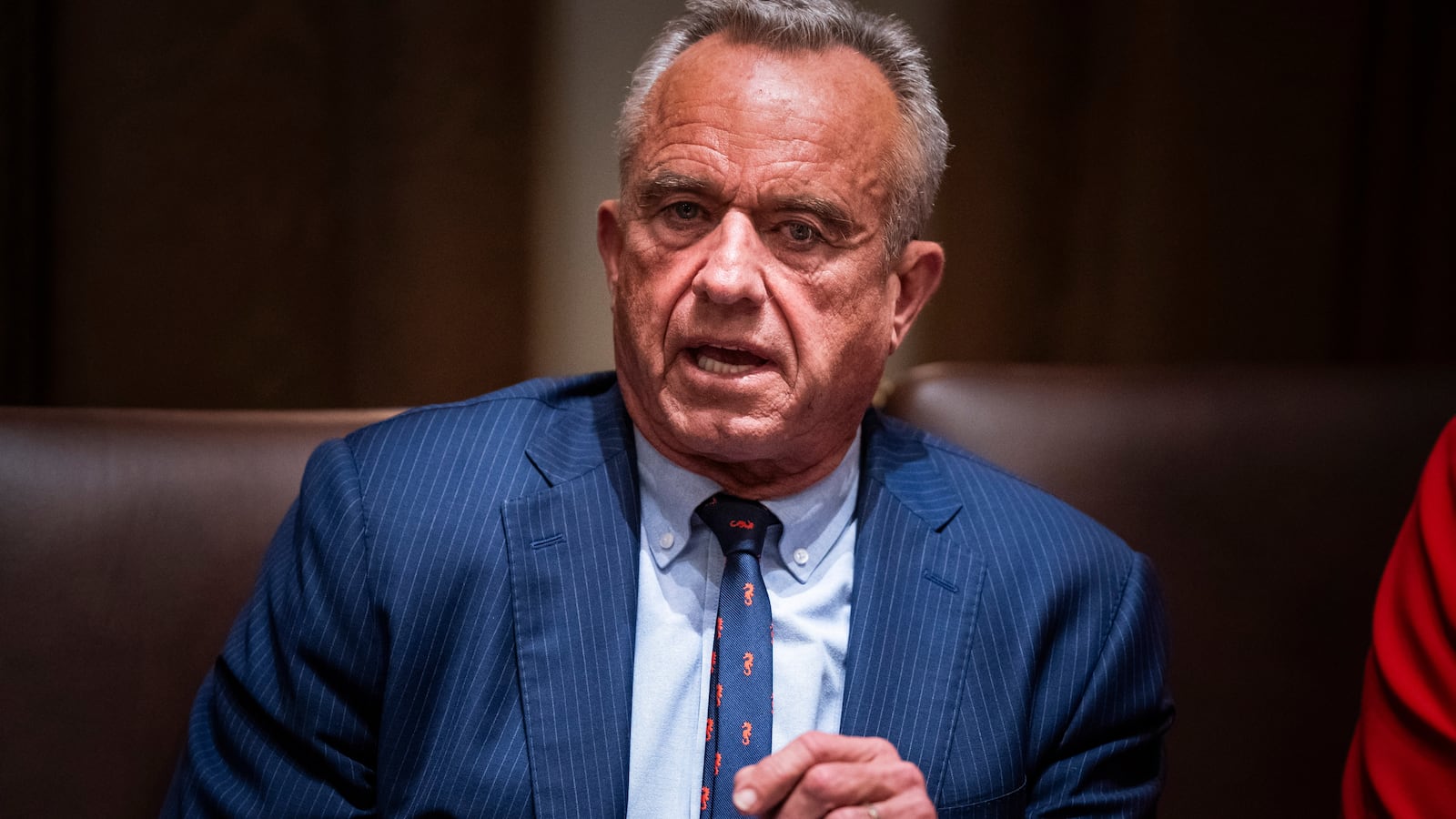 Health and Human Services Secretary Robert F. Kennedy Jr. speaks with President Donald J Trump during a cabinet meeting at the White House on Monday, March 24, 2025 in Washington, DC.